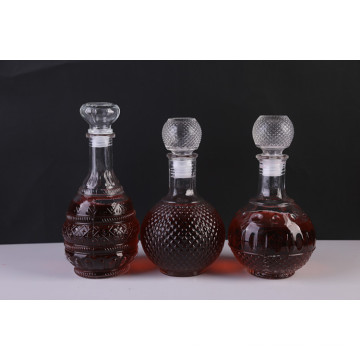 New design round glass decanter/emboss glass decanter/sealed glass storage bottle.